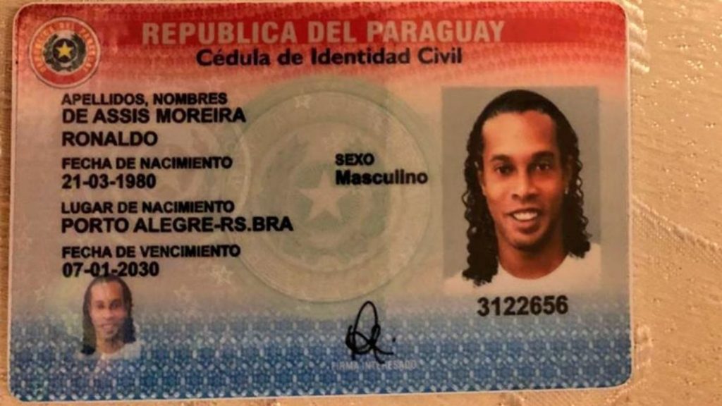 Ronaldinho was pictured surrounded by Paraguayan authorities as they searched his hotel room. Pic: Paraguayan Prosecutor's Office
